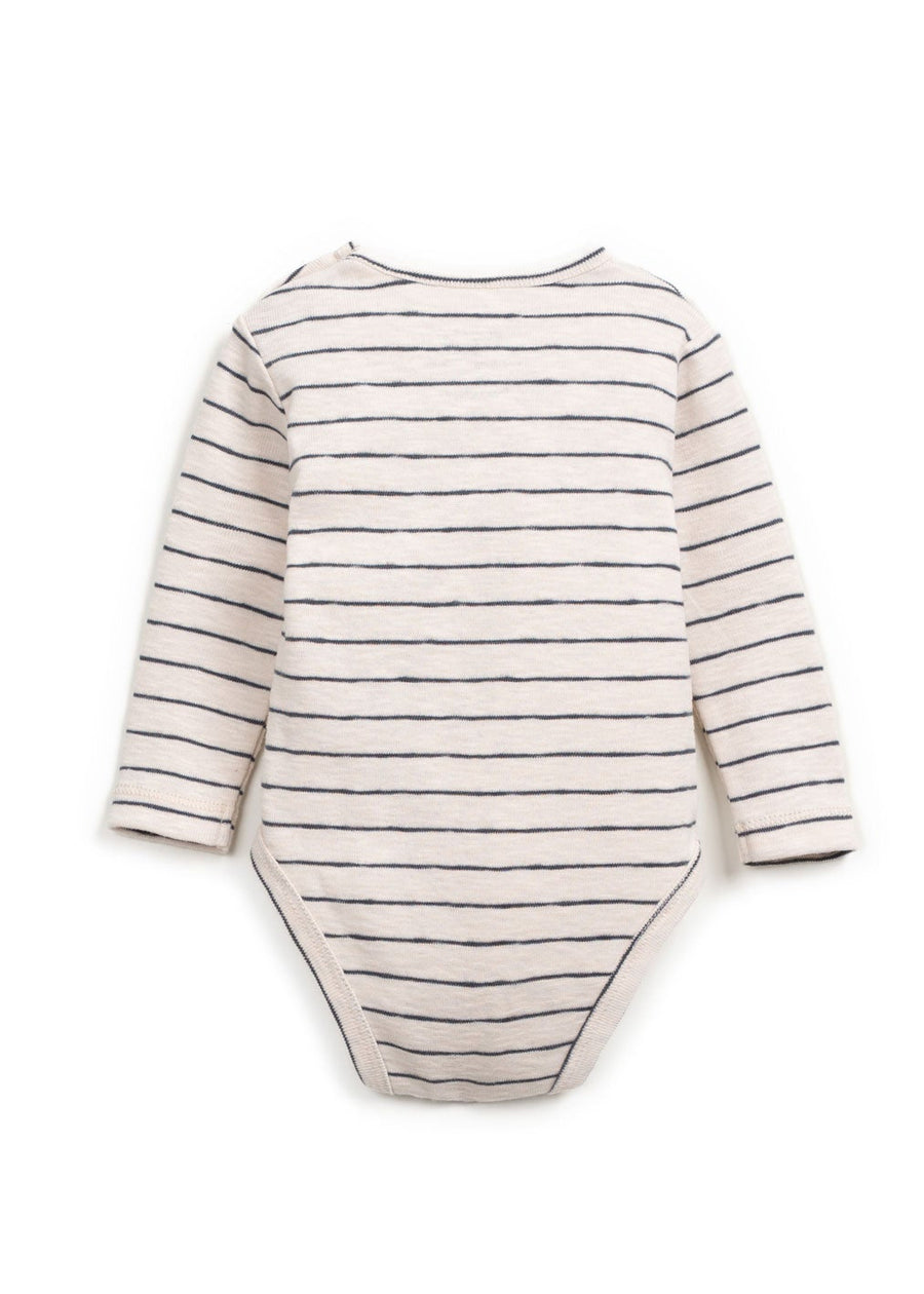 Striped baby onesie on a white background