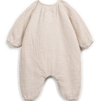Beige baby onesie with bunny ears on a white background