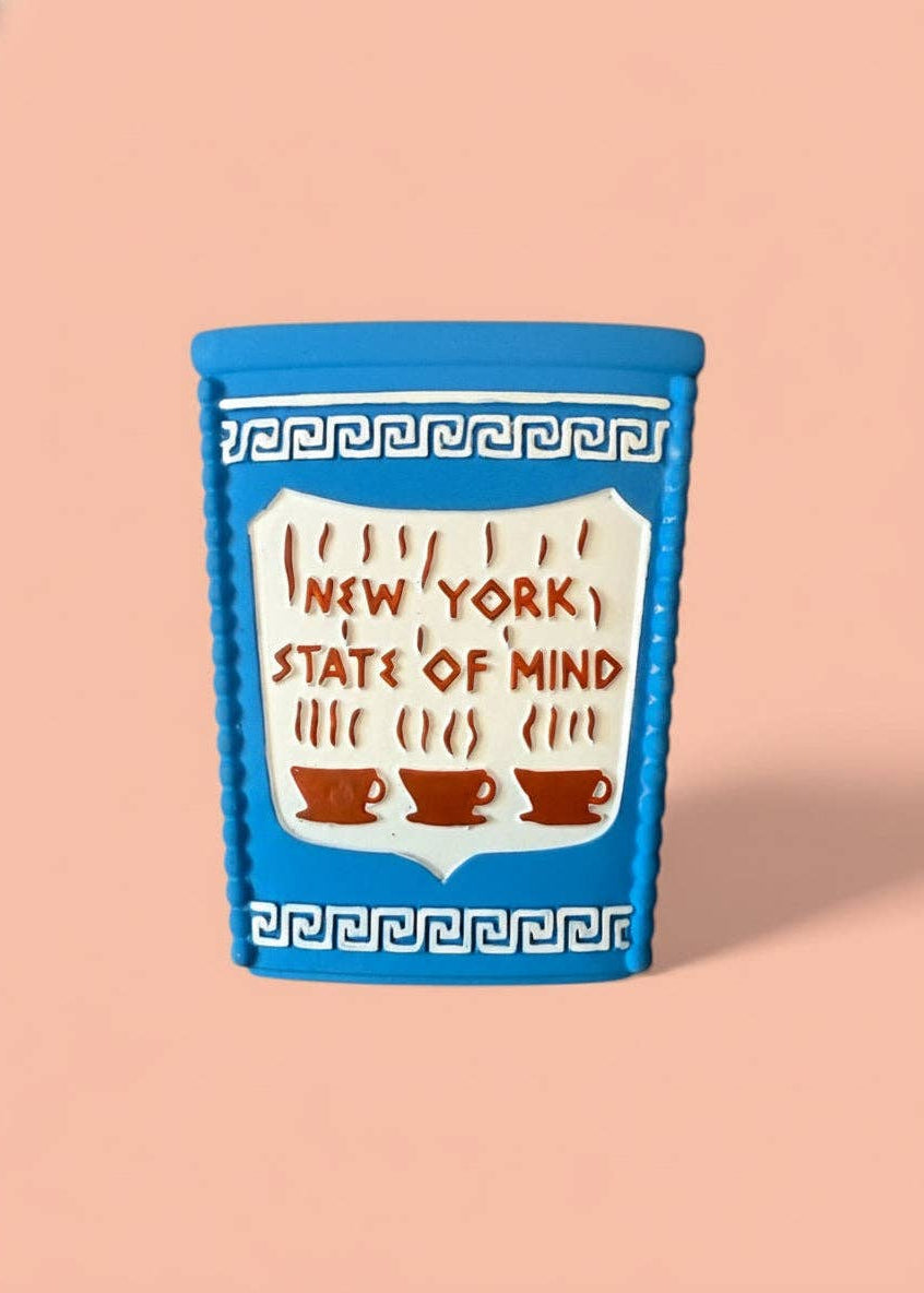 Blue container with 'New York State of Mind' text and coffee cup design on a pink background