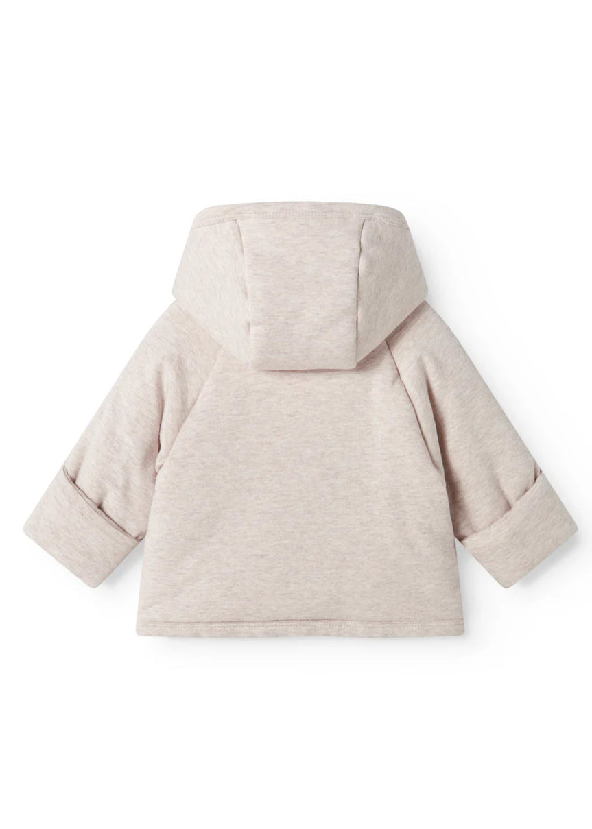 Beige coat on a white background