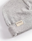 Gray fabric with a brand label on a white background