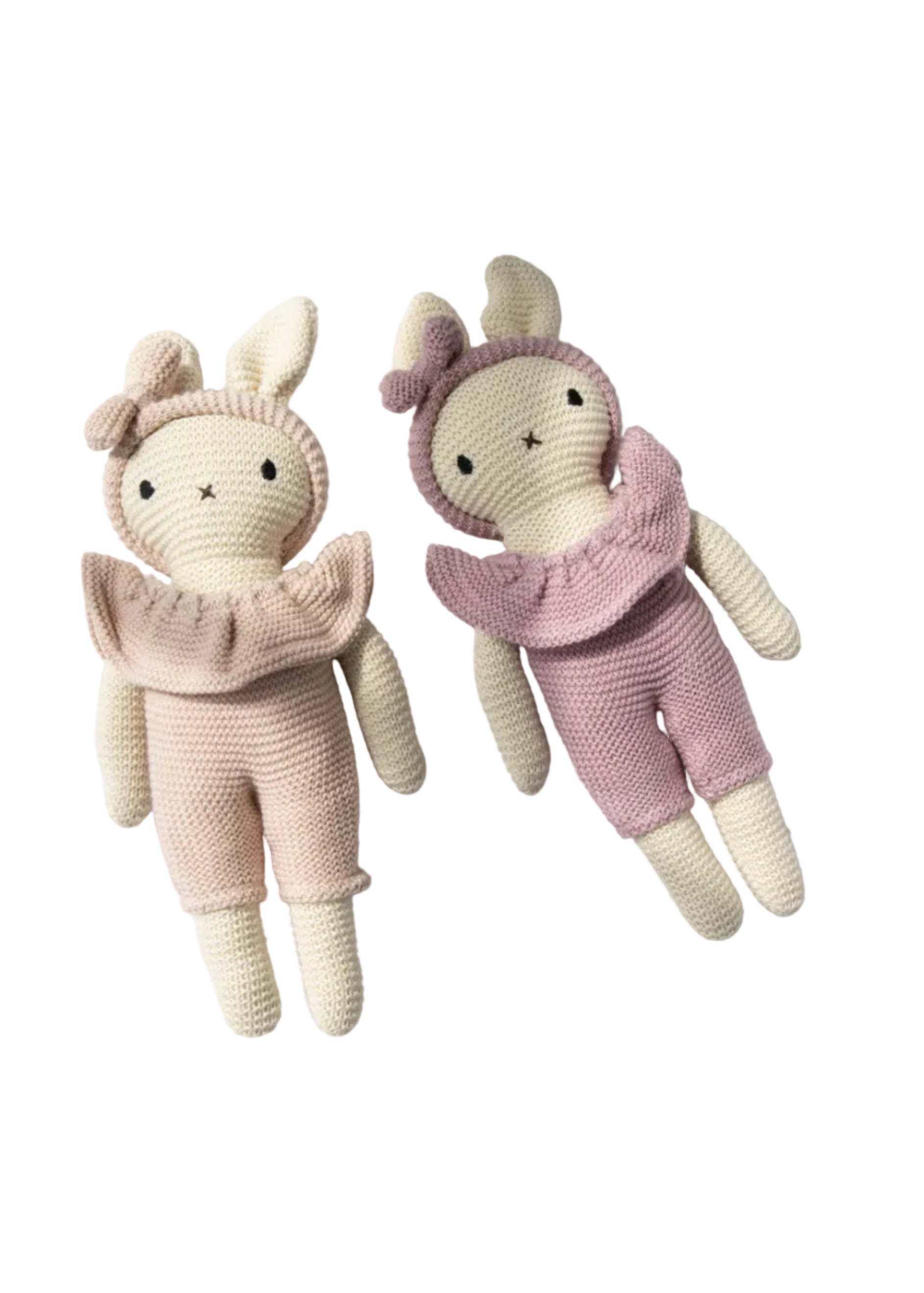 Two knitted dolls, one in beige and the other in pink, on a white background.