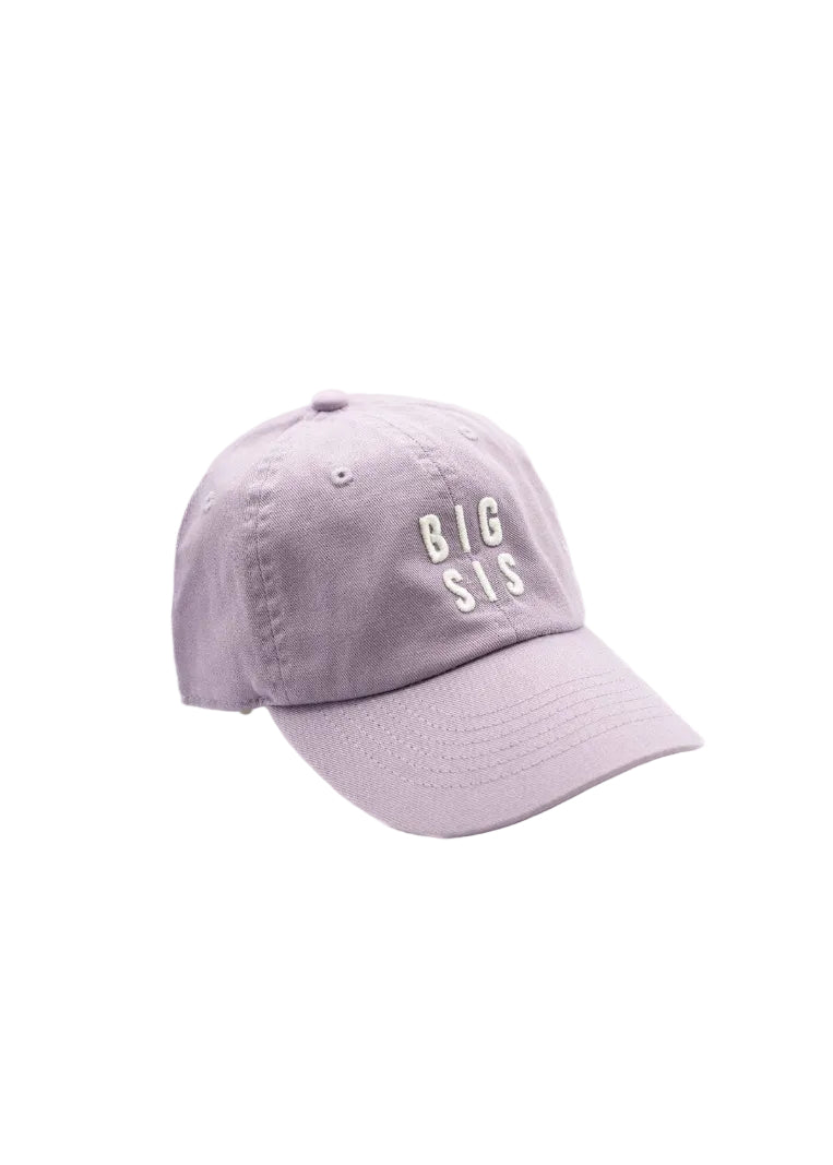 Lavender baseball cap with 'BIG SIS' text on a white background