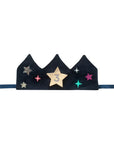 Black tiara with decorative stars and a number 3 on a white background