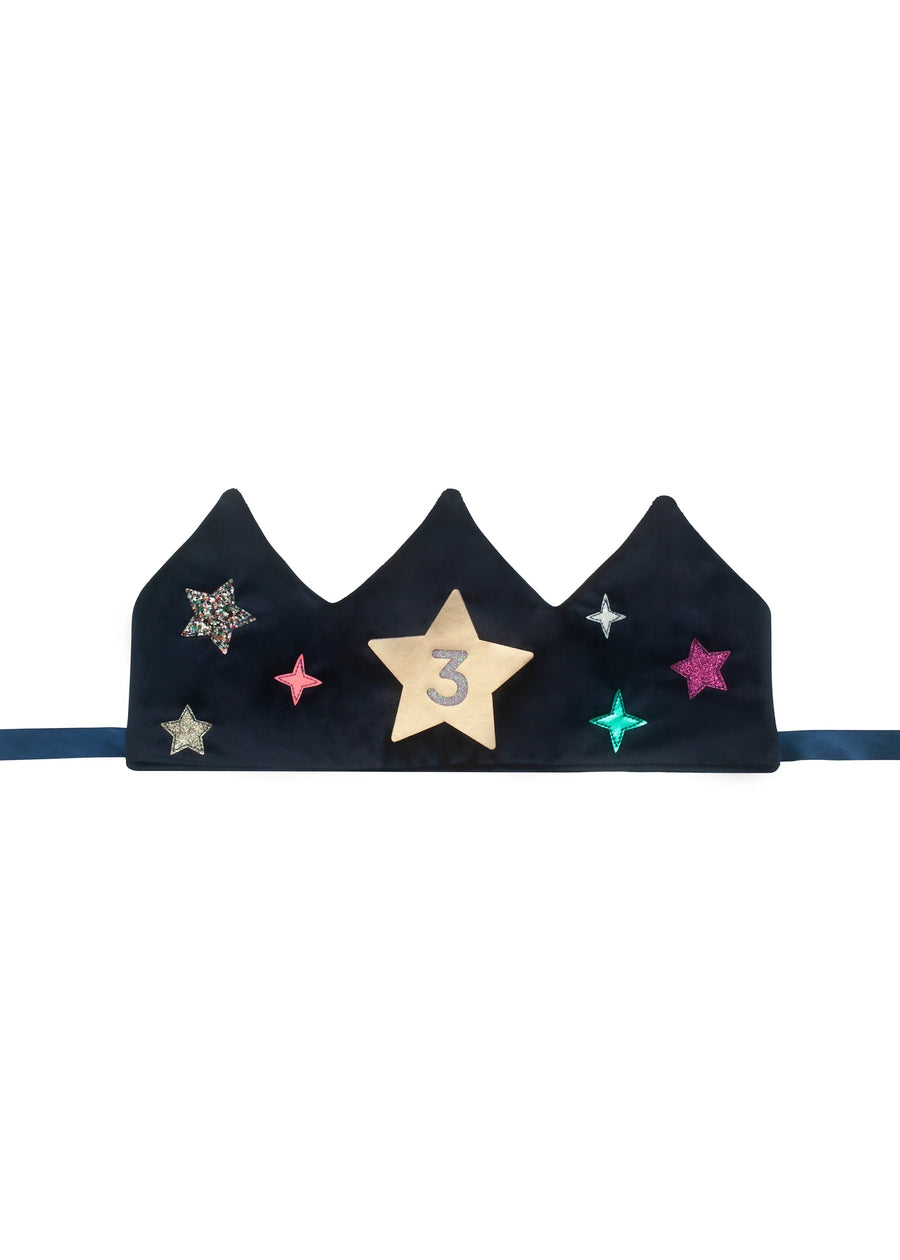 Black tiara with decorative stars and a number 3 on a white background