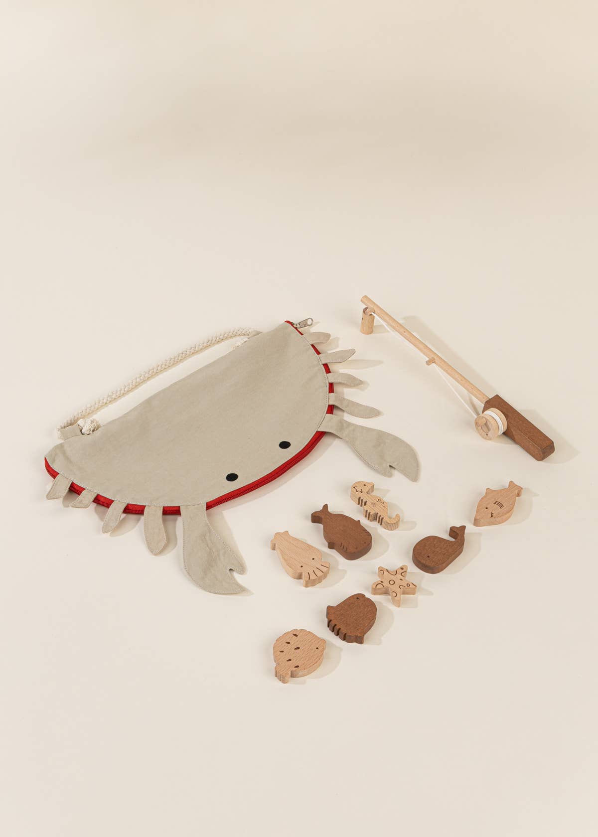 WOODEN FISHING GAME IN CRAB BAG
