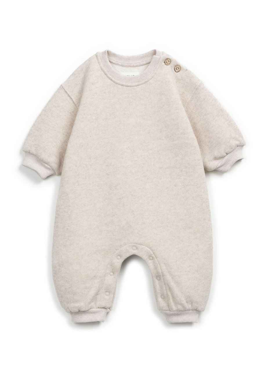 Beige baby onesie on a white background