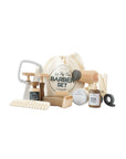 Le Toy Van Barber Set with various grooming tools and a drawstring bag on a white background