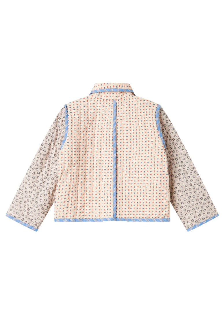 Beige quilted jacket with blue accents on a white background