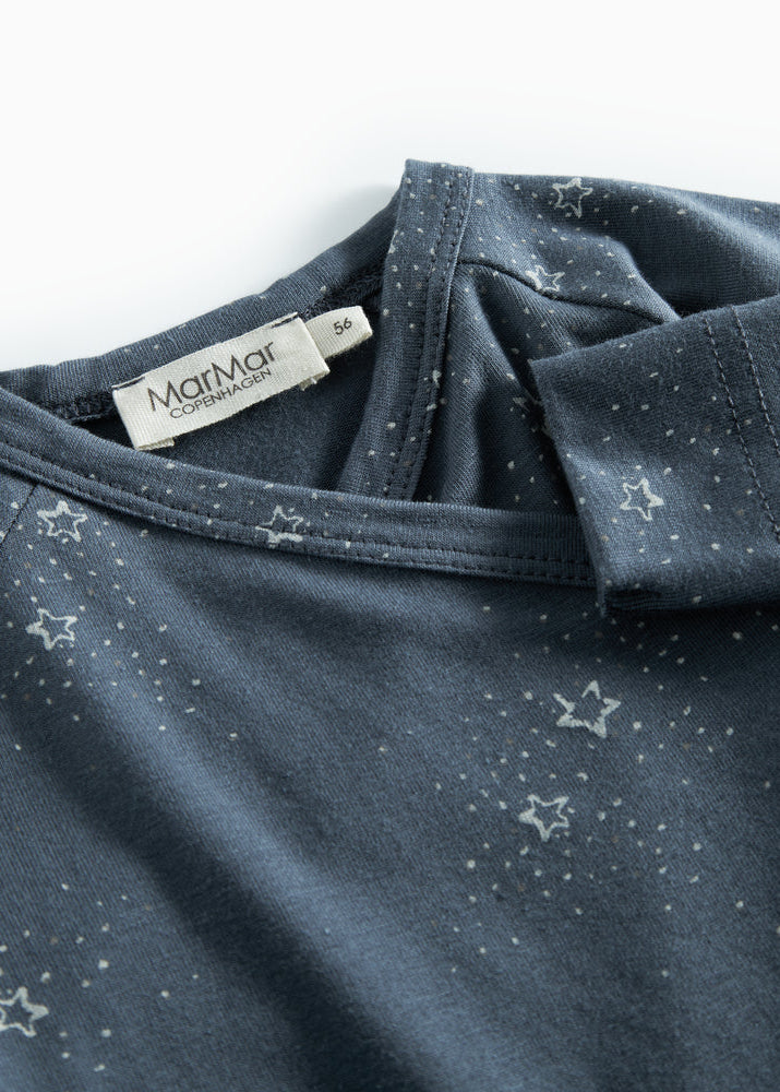 Dark blue shirt with star pattern and Marmar brand label on a white background