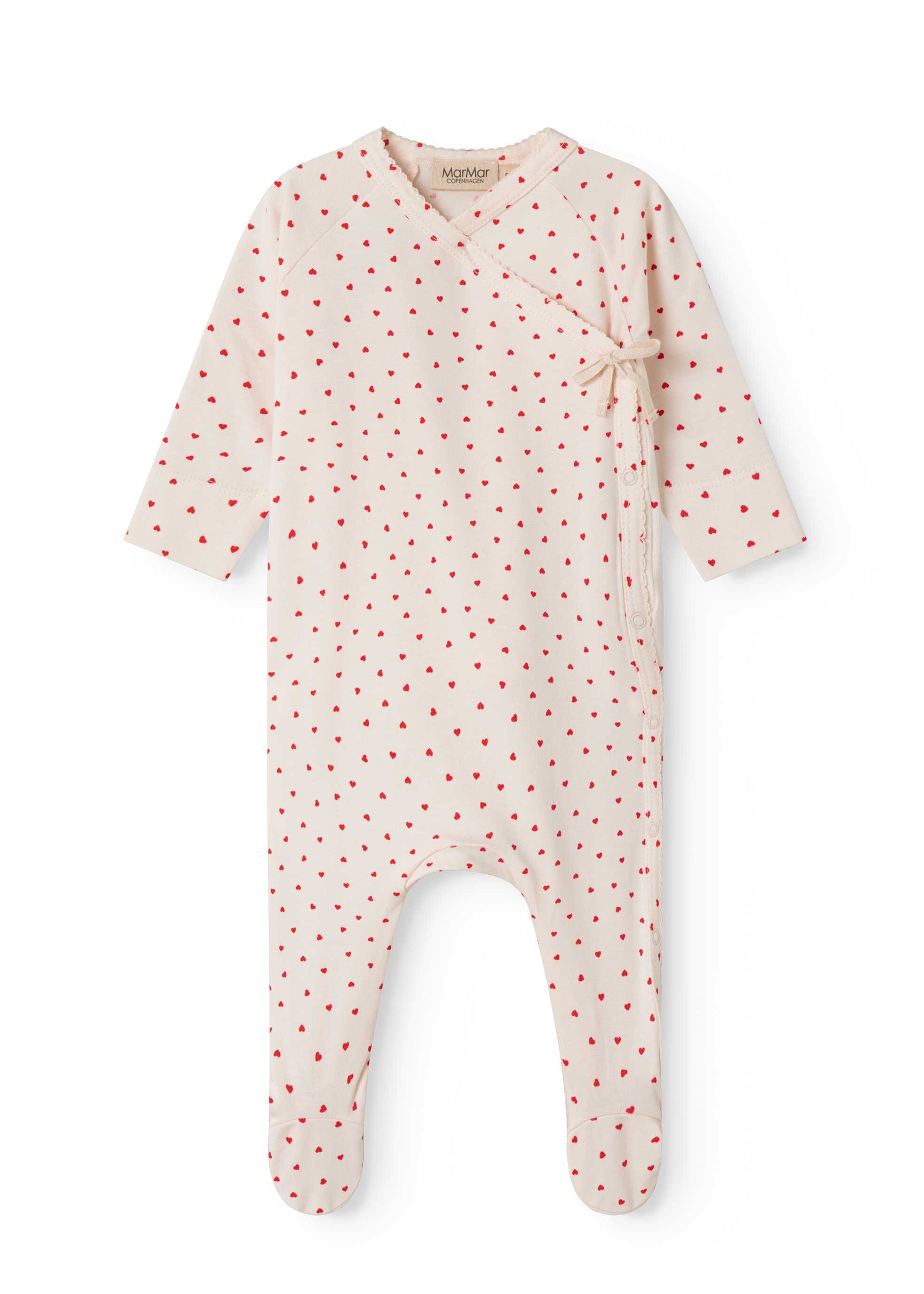 Baby onesie with red pattern on a white background
