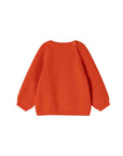 A bright orange ribbed knit long-sleeve baby sweater shown from the back, featuring a crew neck and two small snap buttons at the upper back, set against a plain white background.
