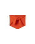 A bright orange ribbed knit bandana or headwrap tied in a knot at the top, displayed flat against a clean white background.