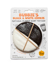 Packaged black and white cookie-shaped baby teether with 'Bubbie's' branding on a white background.