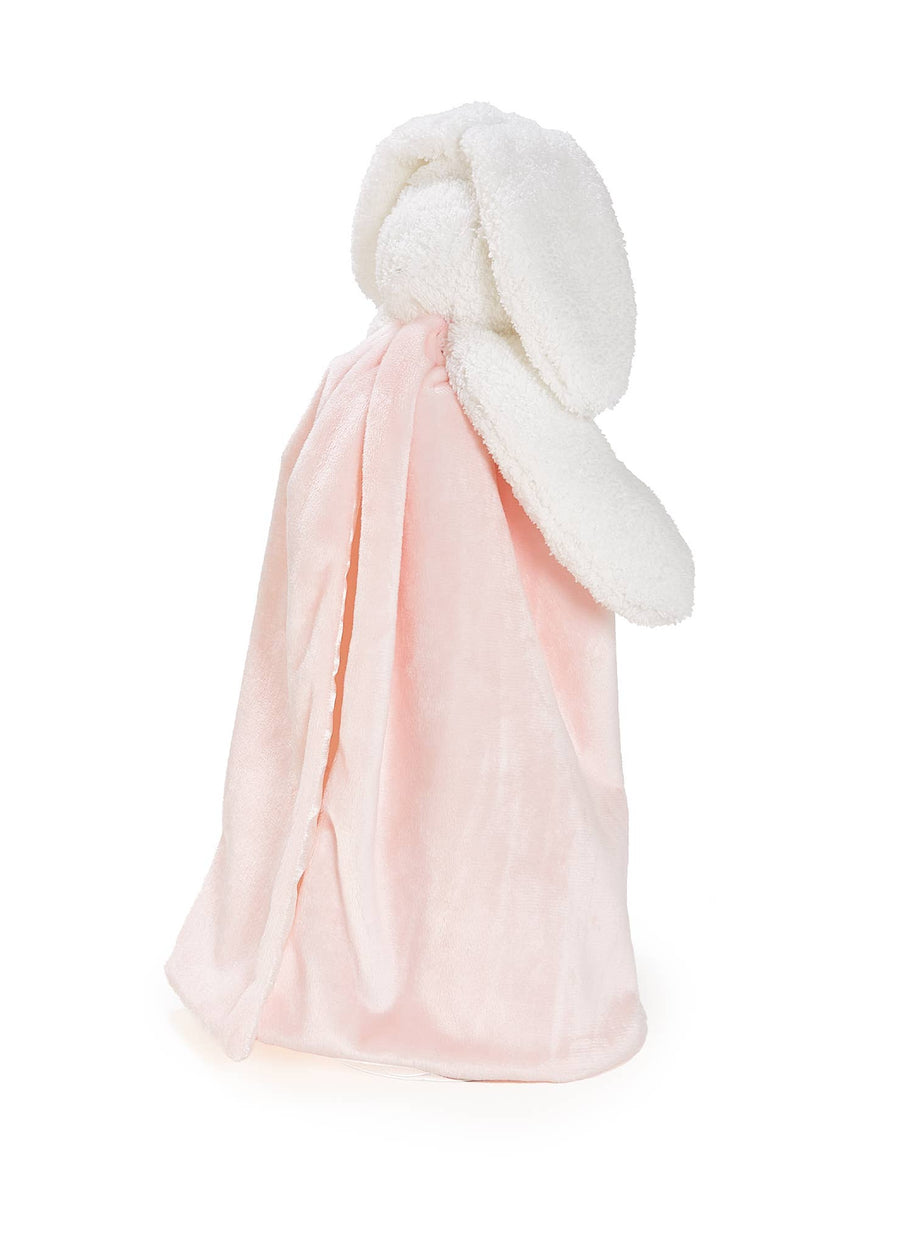 Pink and white plush blanket on a white background