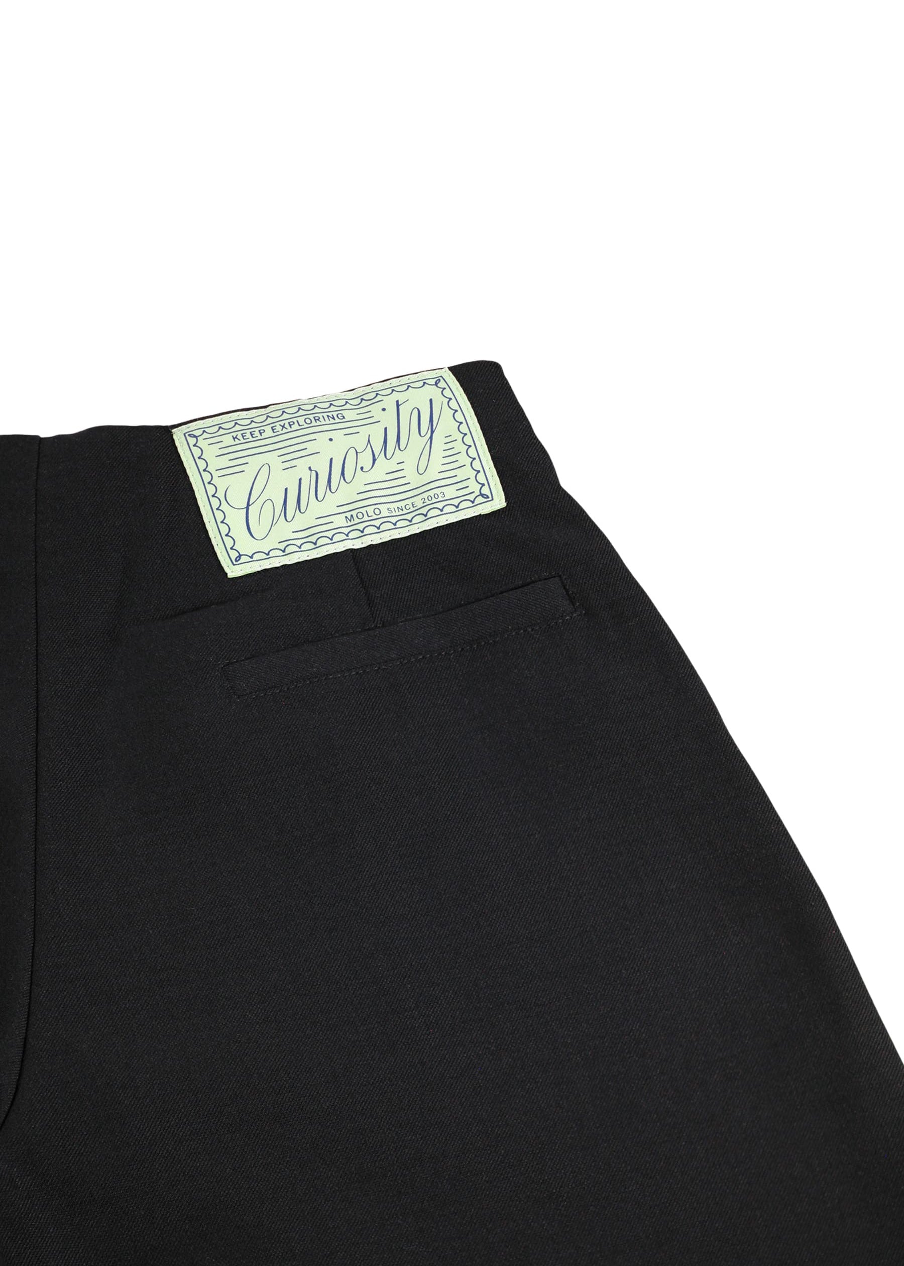 Black pants with a 'Curiosity' label on a white background
