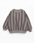 Gray and white striped sweater on a white background