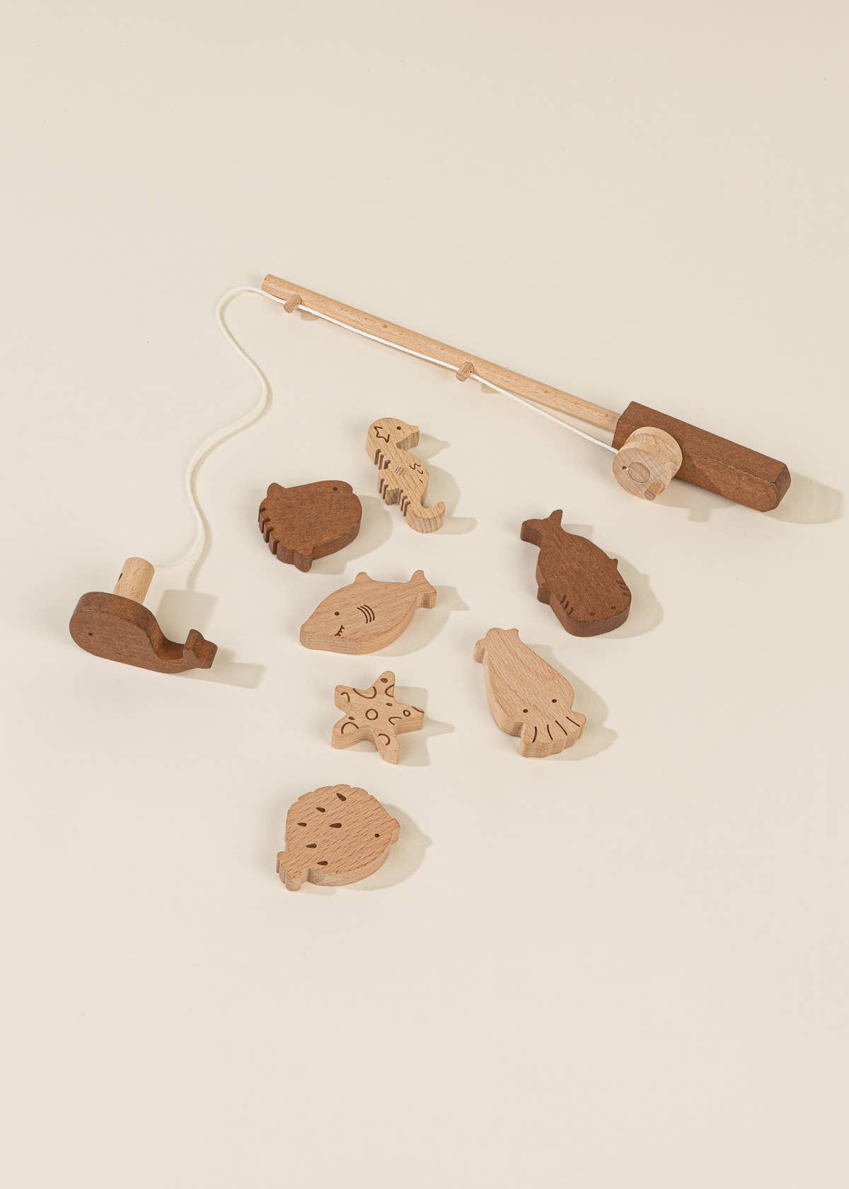 WOODEN FISHING GAME IN CRAB BAG