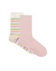 Pink sock with colorful striped pattern on a white background
