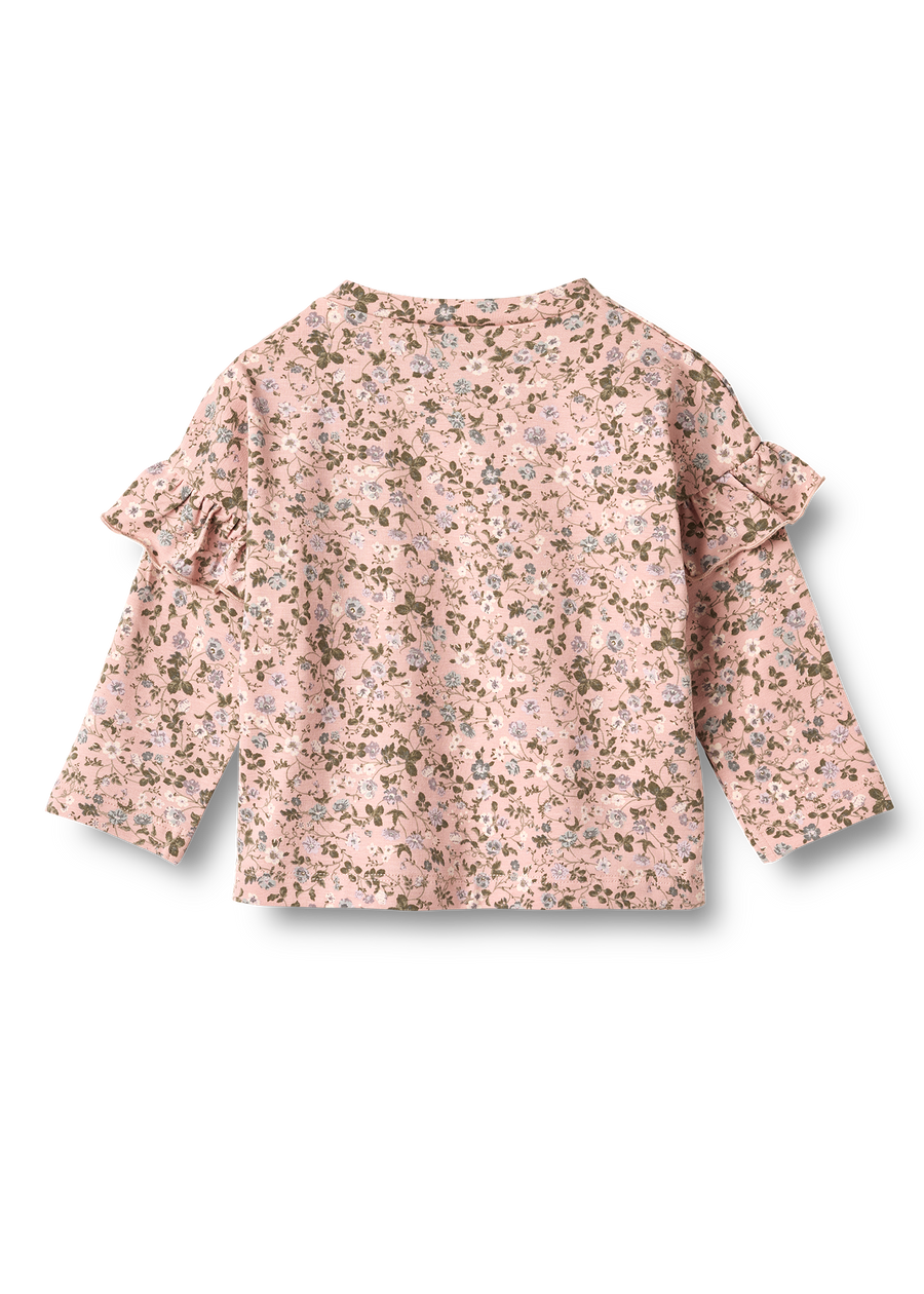Floral blouse with ruffled sleeves on a white background