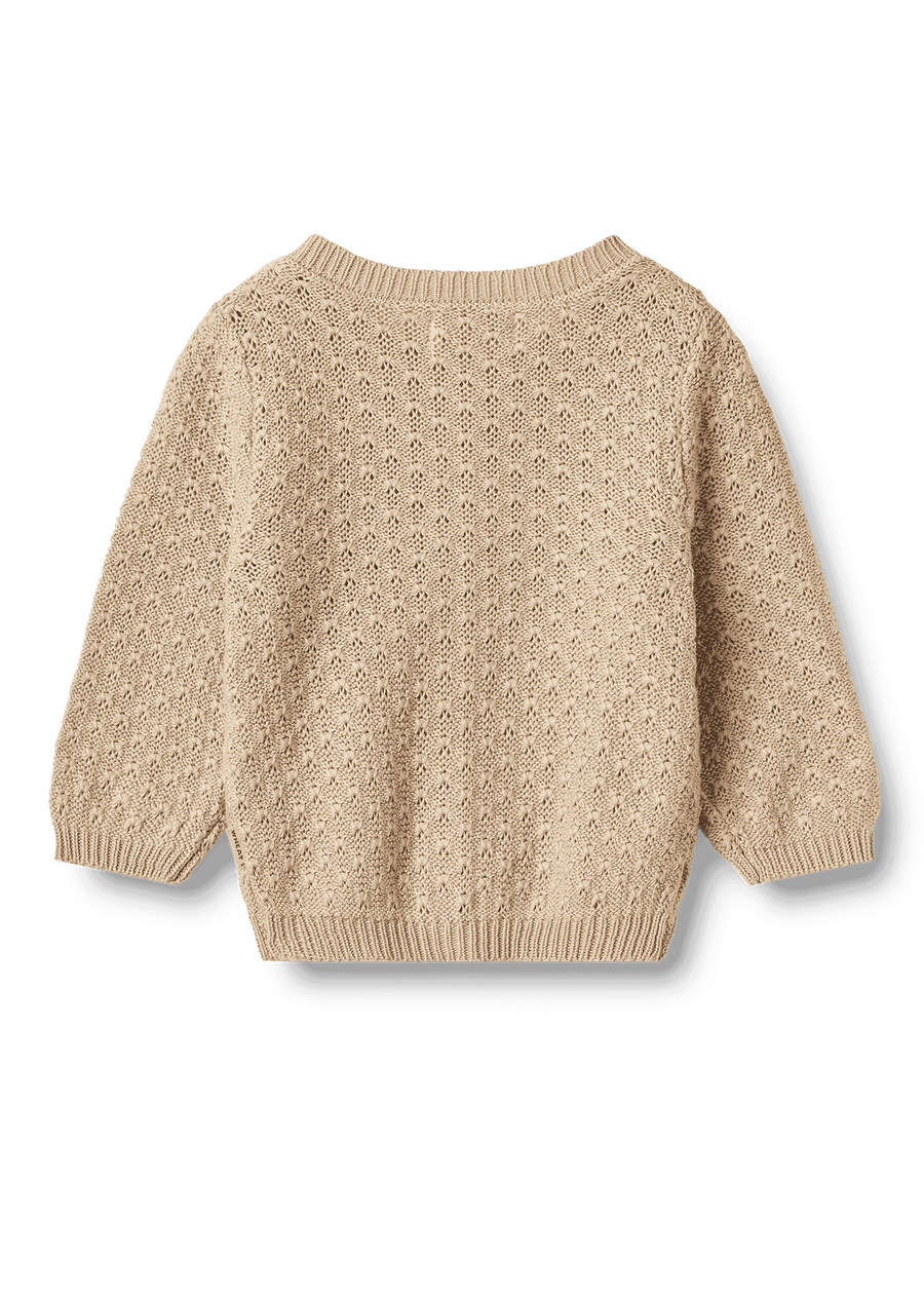 Beige knitted sweater on a white background
