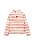 A long-sleeve mock neck top with horizontal stripes in dusty pink and cream, featuring a small red heart on the chest and a frayed hem.