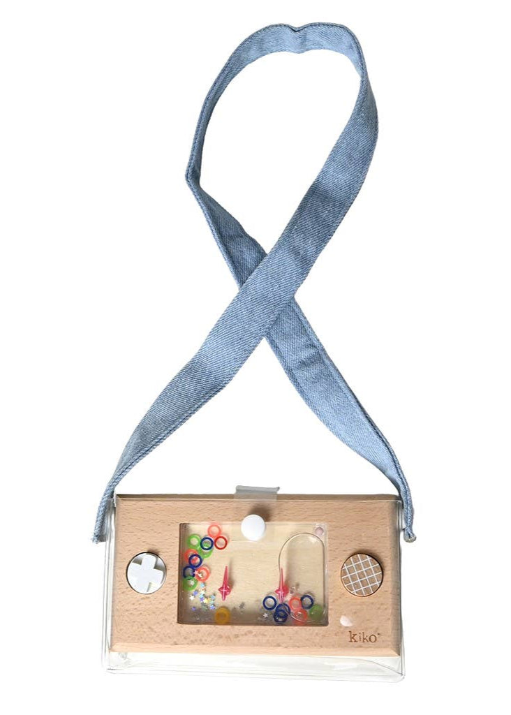 Wooden toy with colorful balls inside, attached to a blue ribbon on a white background