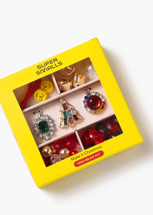 Colorful jewelry set in a yellow box labeled 'Super Smalls' on a white background
