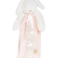 Bunny-shaped plush toy with a pink blanket on a white background