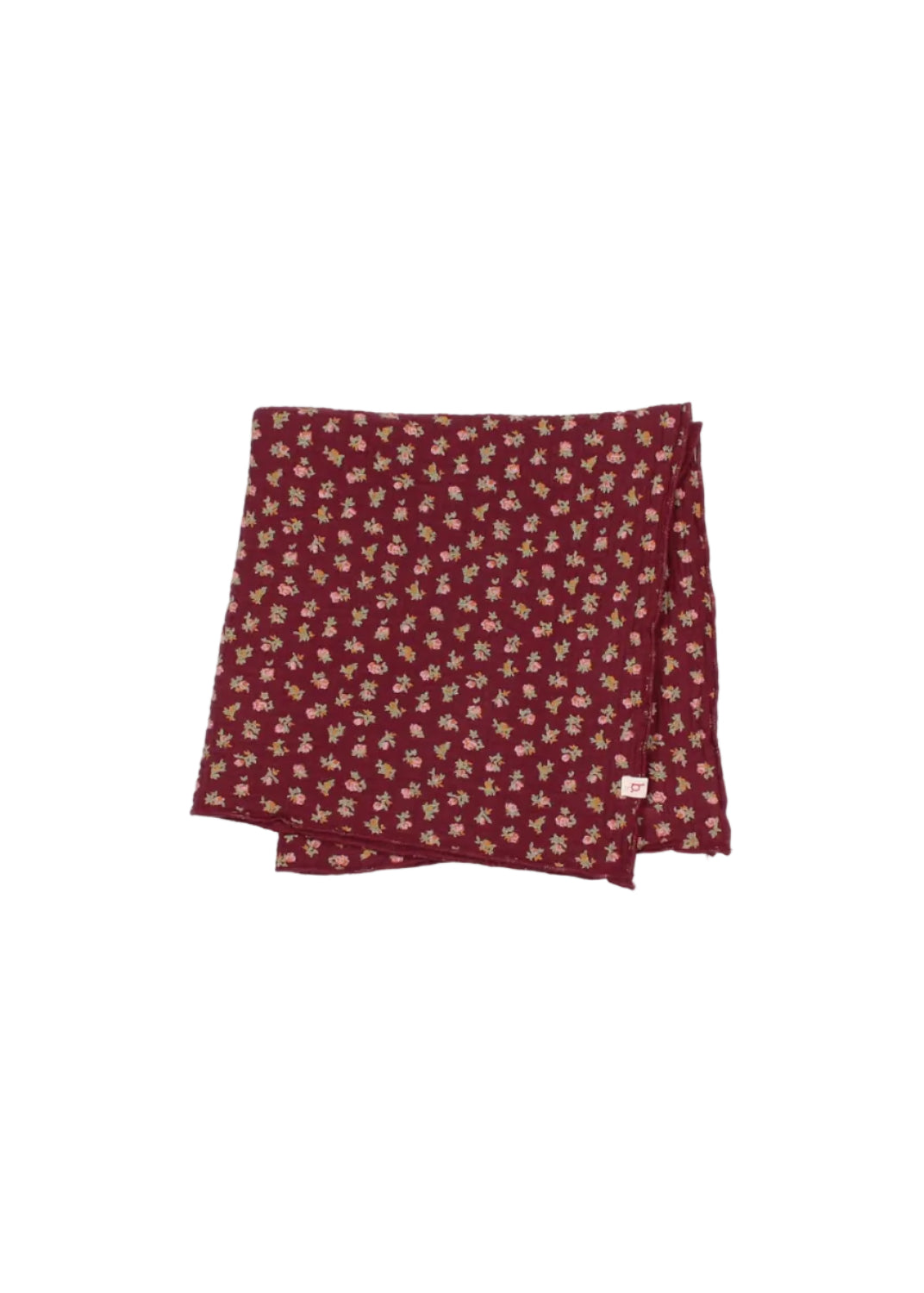 Folded fabric with small floral pattern on a white background