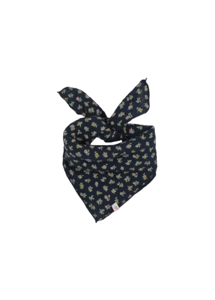 A navy blue pet bandana with a small yellow and green floral pattern, tied in a knot at the top, displayed on a light gray background.