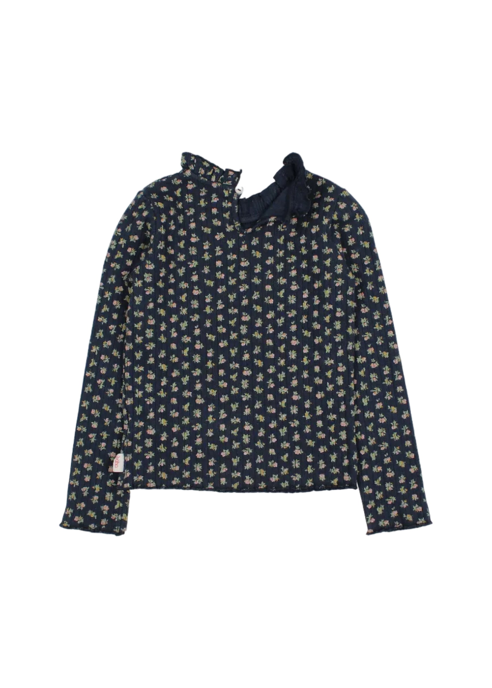 A long-sleeve top with a dark navy base and a dense, small-scale floral pattern in light green, yellow, and white. It features a high, ruffled mock neck collar with a tie detail at the back, shown against a plain white background.