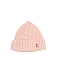 A light pink ribbed knit beanie hat with a small embroidered burgundy letter 'b' logo on the front cuff, shown against a plain light gray background.