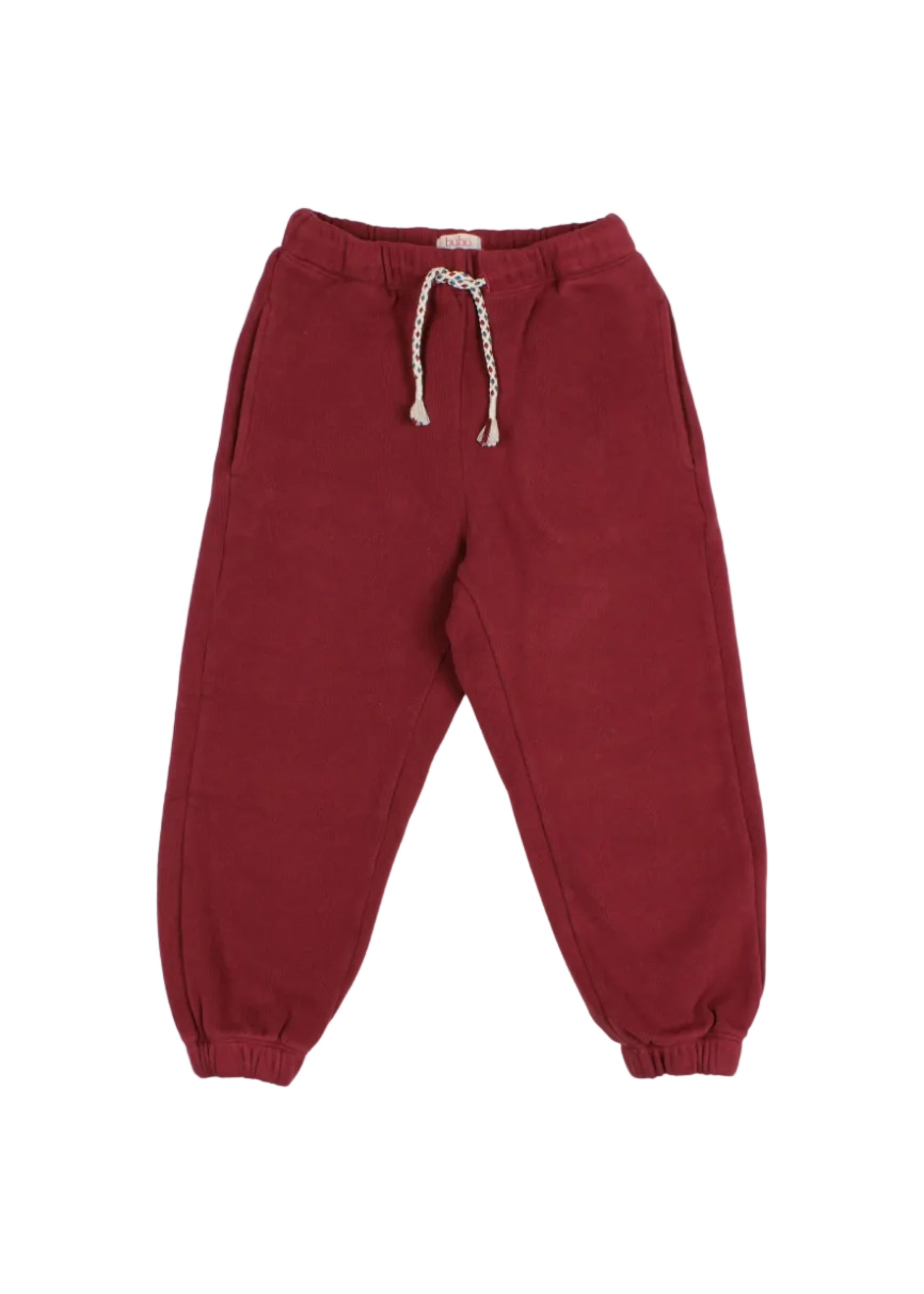 A pair of dark red jogger pants with an elastic waistband, a braided drawstring, and elastic cuffs, shown flat on a light gray background.