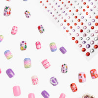 Collection of colorful nail art decorations on a white background