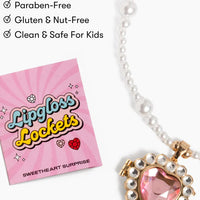 Lipgloss Lockets necklace with pink heart locket and packaging on a white background