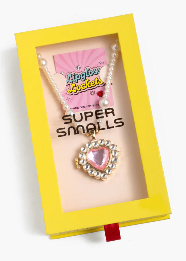 Necklace with heart pendant in a 'Super Smalls' box, featuring Lippy Locks branding.