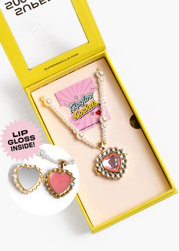 Heart-shaped lip gloss and earrings set in a yellow box with 'Lip Gloss Inside!' text.
