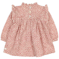 Red floral blouse on a white background
