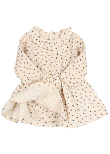 Beige floral dress on a white background