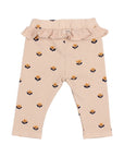 Beige baby leggings with floral pattern and ruffled waistband on a white background