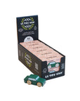 Display box of Le Toy Van toy cars with a green car in front on a light background