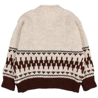 Beige sweater with brown and black pattern on a white background