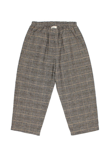 Plaid patterned pants on a white background