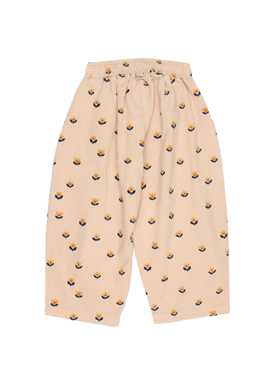 Beige pants with small pattern on a white background