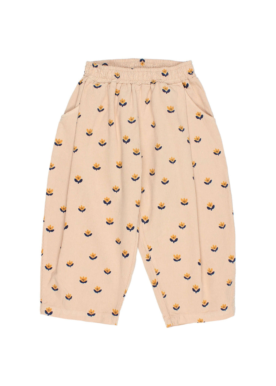 Beige pants with small pattern on a white background