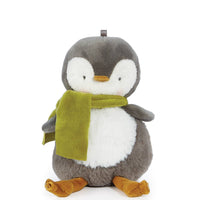 Plush penguin toy with a green scarf on a white background
