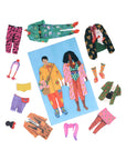 Colorful paper dolls with accessories on a white background