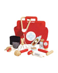 Red toy first aid kit with various medical tools on a white background