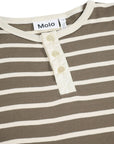 Close-up of a Molo brand striped henley shirt in brown and cream, featuring a three-button placket and ribbed collar.